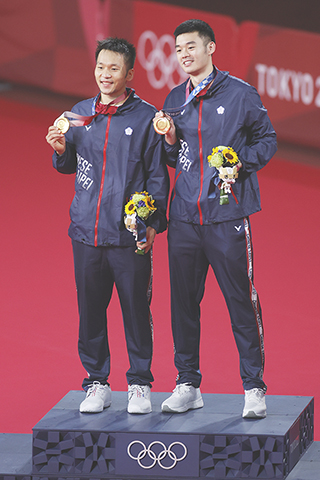 ◎ 七月三十一日,在東京奧運會羽毛球男子雙打決賽中,中國台北組合李洋/王齊麟獲得冠軍。(中新社記者 杜洋 攝)