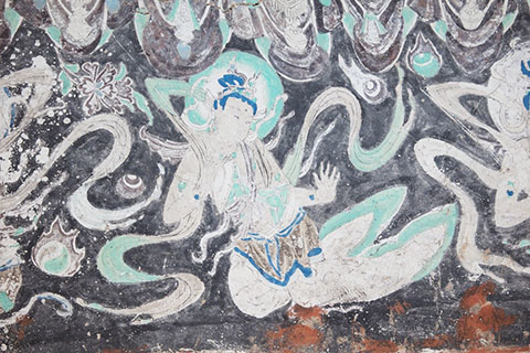 ◎ 十月十二日,兩岸合辦的《妙音莫高──敦煌樂舞專題展》在線上開展。圖為展覽中呈現的敦煌榆林窟中的飛天樂伎。(敦煌研究院供圖)